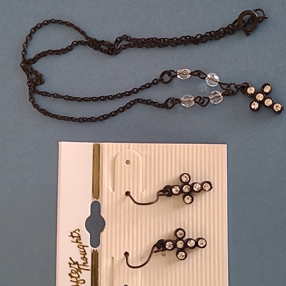Cross necklace and earrings.